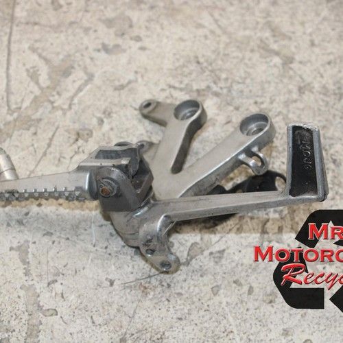 02 03 HONDA CBR954 RR CBR 954 FIREBLADE OEM BENT RIGHT DRIVER PEG BRACKET C4