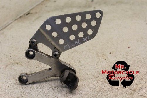 02 03 HONDA CBR 954 RR CBR954RR OEM LEFT FRONT PEG BRACKET REARSET DRIVER  I-17